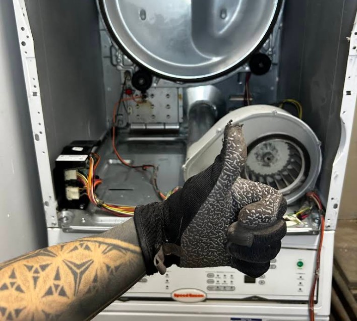 Barton Appliance Technician Fixing Appliance In North Vancouver