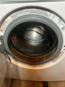 Barton Appliance Technician Fixing Dryer In North Vancouver