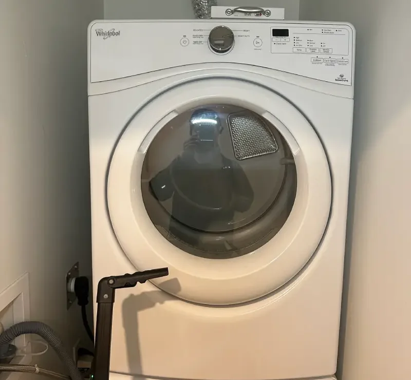 Barton Appliance Technician Fixing Dryer In Richmond